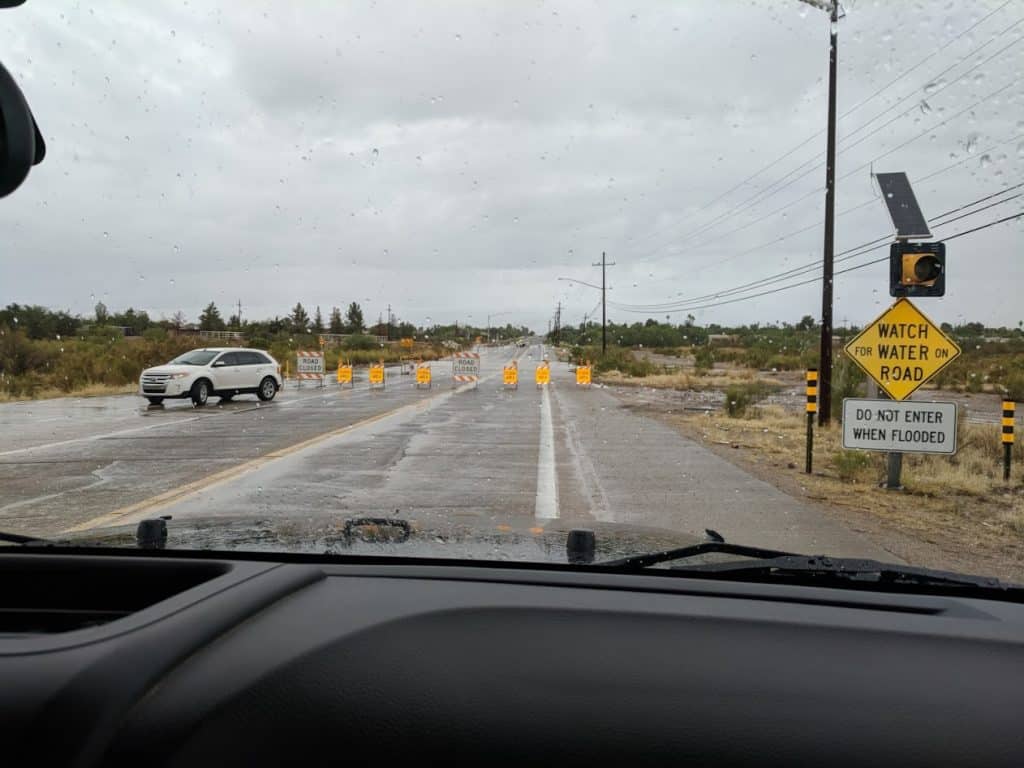 a smart motorist turns around at a flooded wash in arizona